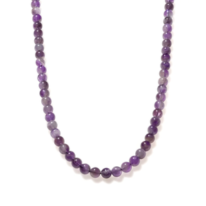 A beaded necklace made of polished purple beads