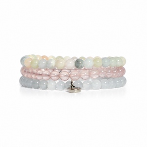 three different bracelets on a white background