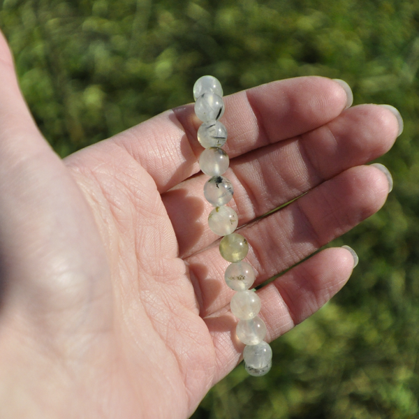 Prehnite bracelet worn on the wrist